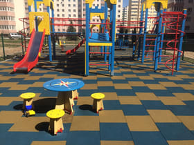 Rubber covering for playgrounds